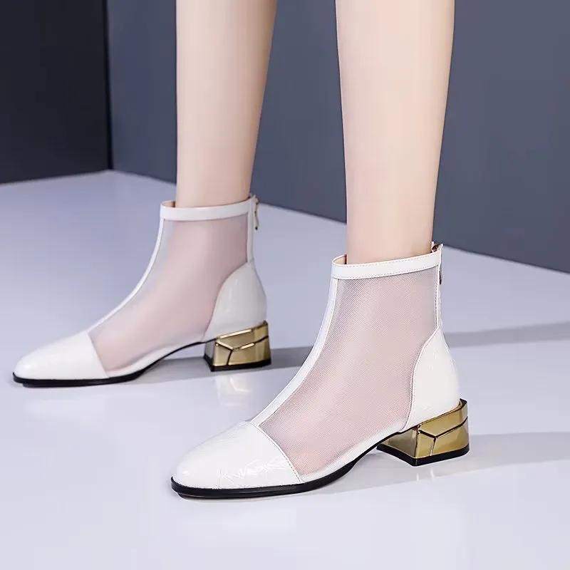 Embossed Elegance High Heeled Booties