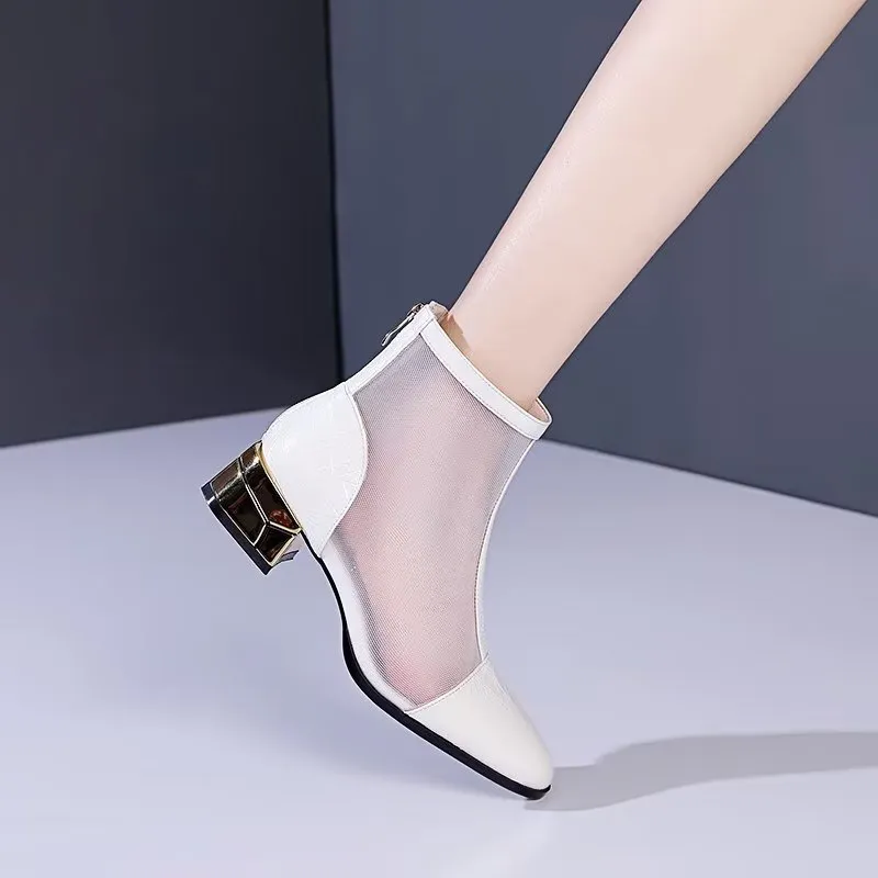 Embossed Elegance High Heeled Booties